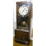 An oak cased time recorder clock by Gledhill-Brook, UK. A. E. A. No.2707/ER 0010, with printed