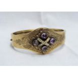 A Victorian gold clasp bracelet, set with cabochon amethyst and seed pearls in cross motif