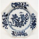 An 8½" antique Delft octagonal plate with floral decoration
