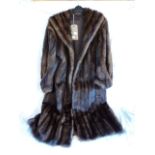 An early to mid 20th Century full length Musquash fur coat