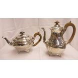 A silver coffee pot of fluted baluster design and a matching teapot - both London 1900 - different
