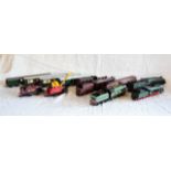 A small collection of unboxed Hornby "OO" guage locomotives and rolling stock, including "City of