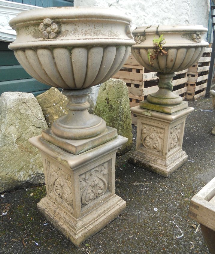 A pair of 37" late 19th Century glazed terracotta classical style pedestal planters sat on Art