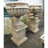 A pair of 37" late 19th Century glazed terracotta classical style pedestal planters sat on Art