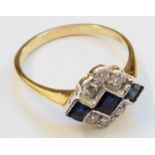 A 1930's style 18ct. gold ring, set with three square sapphires and six brilliant cut diamonds