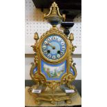 A 19th Century French gilt spelter cased ornate mantel clock, with classical vase to top,
