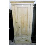 A 36" Victorian waxed pine single wardrobe, with rounded moulded cornice, hanging space enclosed