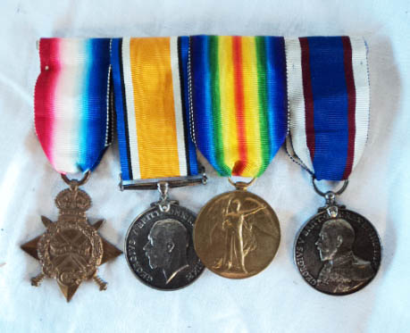 G. W. Wood, 233226, Royal Fleet Reserve: medal bar of four medals, comprising Mons Star, Rank