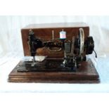 A late 19th Century German Frister & Rossmann hand operated sewing machine with mother-of-pearl