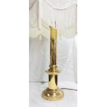 A brass column pattern table lamp