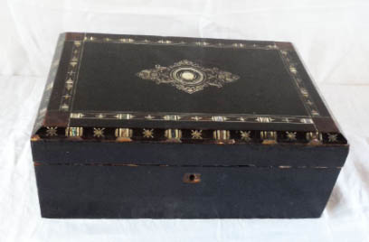 A 19th Century ebonised workbox carcass with mother-of-pearl decoration