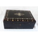 A 19th Century ebonised workbox carcass with mother-of-pearl decoration