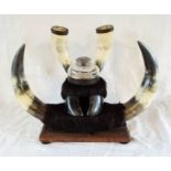 A Victorian inkstand mounted with cow horns and hoof