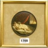 A framed and mounted oil on circular papier-mache lid, depicting two nude females on a day bed