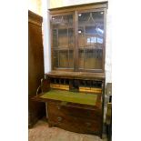 A 3' 4" antique mahogany secretaire/bookcase, with astragal glazed top section and fall front