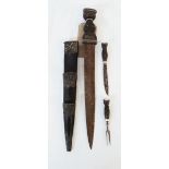 An early 20th Century Scottish dirk with bye knife and bye fork and leather clad scabbard, the