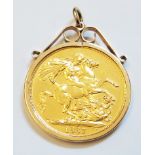 An 1887 gold Victorian two pound coin, loose mounted in a 9ct. pendant frame