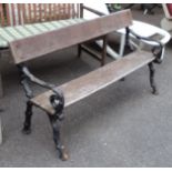 A 4' 2" Coalbrookdale style bench with branch pattern cast iron ends