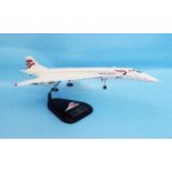A Bravo Delta handmade mahogany model Concorde on takeoff, nose and wheels down, with original