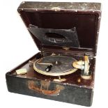 A vintage Victrola rexine clad cased portable wind-up gramophone, by Victor Talking Machine Company,