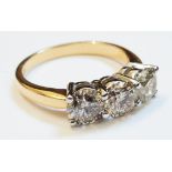 An 18ct. gold three stone diamond ring - 2.13ct.