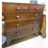 A 3' 6" 19th Century mahogany chest of two short and three long graduated drawers, set on high