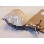 A 4" WMF silvered bronze snail with real shell