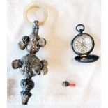 A late Victorian silver rattle with mother-of-pearl ring to top, two tiers of bells and coral