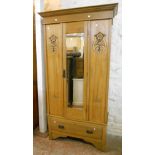A 3' 5" Edwardian satin walnut single wardrobe, with central bevelled mirror panel door with