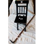 A small stained wood folding chair - sold with a horn handled walking cane with silver collar