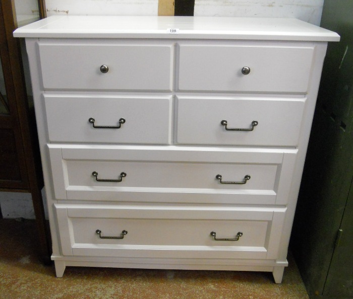 A 3' 5" Laura Ashley Devon chest of four short and two long graduated drawers with all over white