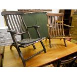 A stained wood framed folding deckchair with lathe back and top rail stamped Gratis - sold with an