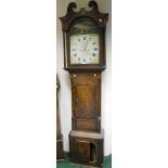 A Georgian inlaid oak longcase clock with broken swan neck pediment, the painted arched dial