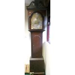 An late 18th Century oak and ebony strung longcase clock with fretwork broken swan neck pediment,