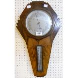 A 21" Art Deco walnut framed barometer/thermometer with flanking stepped fan decoration - retailed
