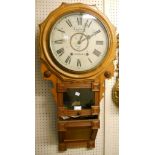 A 19th Century American polished wood cased drop dial wall clock, bearing retailer mark A. J.
