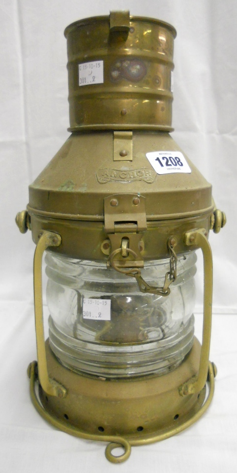 A brass oil fired ship's anchor lantern