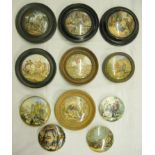 A collection of framed and unframed antique pot lids depicting rural scenes, including "Master of