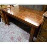 A 4' 11" bespoke mixed wood block top dining table, set on chamfered square legs