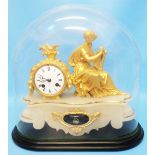 A 19th Century French gilt spelter and alabaster ornate mantel clock, with seated figure of a