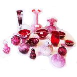 A collection of fifteen pieces of cranberry and ruby glass vases, baskets, etc.