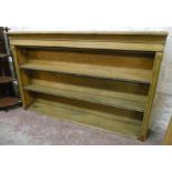 A 4' 9" Victorian waxed pine three shelf open bookcase top with moulded cornice and two adjustable