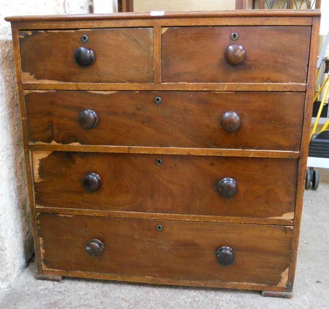 A 36" early 19th Century mahogany and pine chest of two short and three long graduated drawers