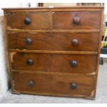 A 36" early 19th Century mahogany and pine chest of two short and three long graduated drawers