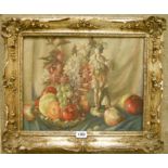 S. Armstrong: an ornate gilt gesso framed oil on canvas, still life with porcelain figure, flowers