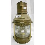 A brass oil fired ship's anchor lantern