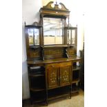 A 4' 4" Edwardian inlaid rosewood side cabinet with broken swan neck pediment and multi bevelled