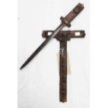 A 19" antique wooden crucifix with INRI over the body of Christ, metal studs to points and