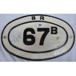 A painted cast iron railway oval bridge plate sign BR 67B
