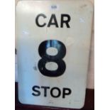 A vintage enamel sign on wooden mount, "Car Stop 8"